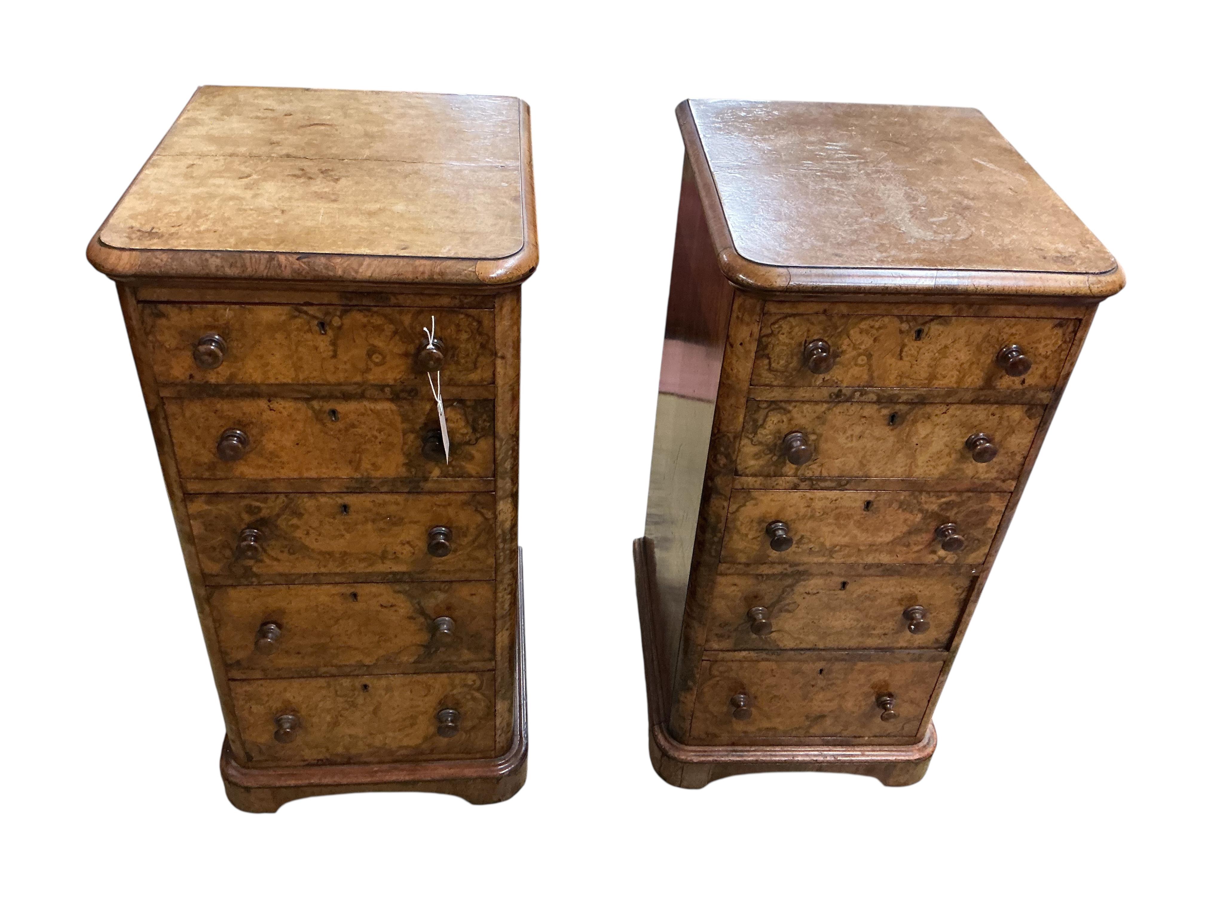 A pair of Victorian figured walnut five drawer bedside chests, adapted from a dressing table, width 43cm, depth 47cm, height 86cm